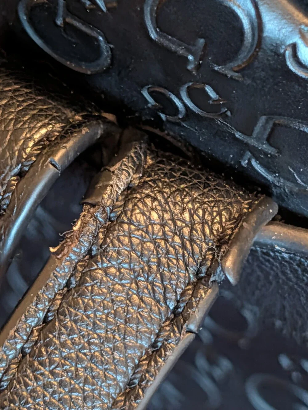 GUESS Black Embossed Logo Mini Backpack with Gold Accent